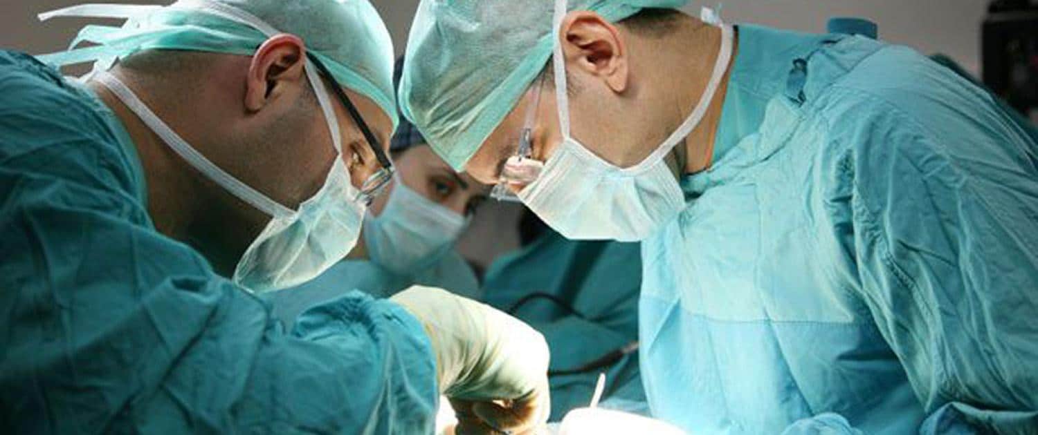 Hernia Surgery. Two surgeons performing an operation